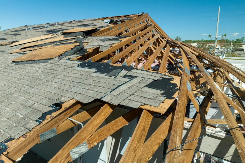Storm Damage Assessment Guide: A Homeowner’s Roof Inspection Checklist damaged house roof with missing shingles after hur 2026 01 07 02 07 52 utc 1